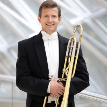 Barry Hearn, director del trombón, presidente de la sinfonía de Dallas.