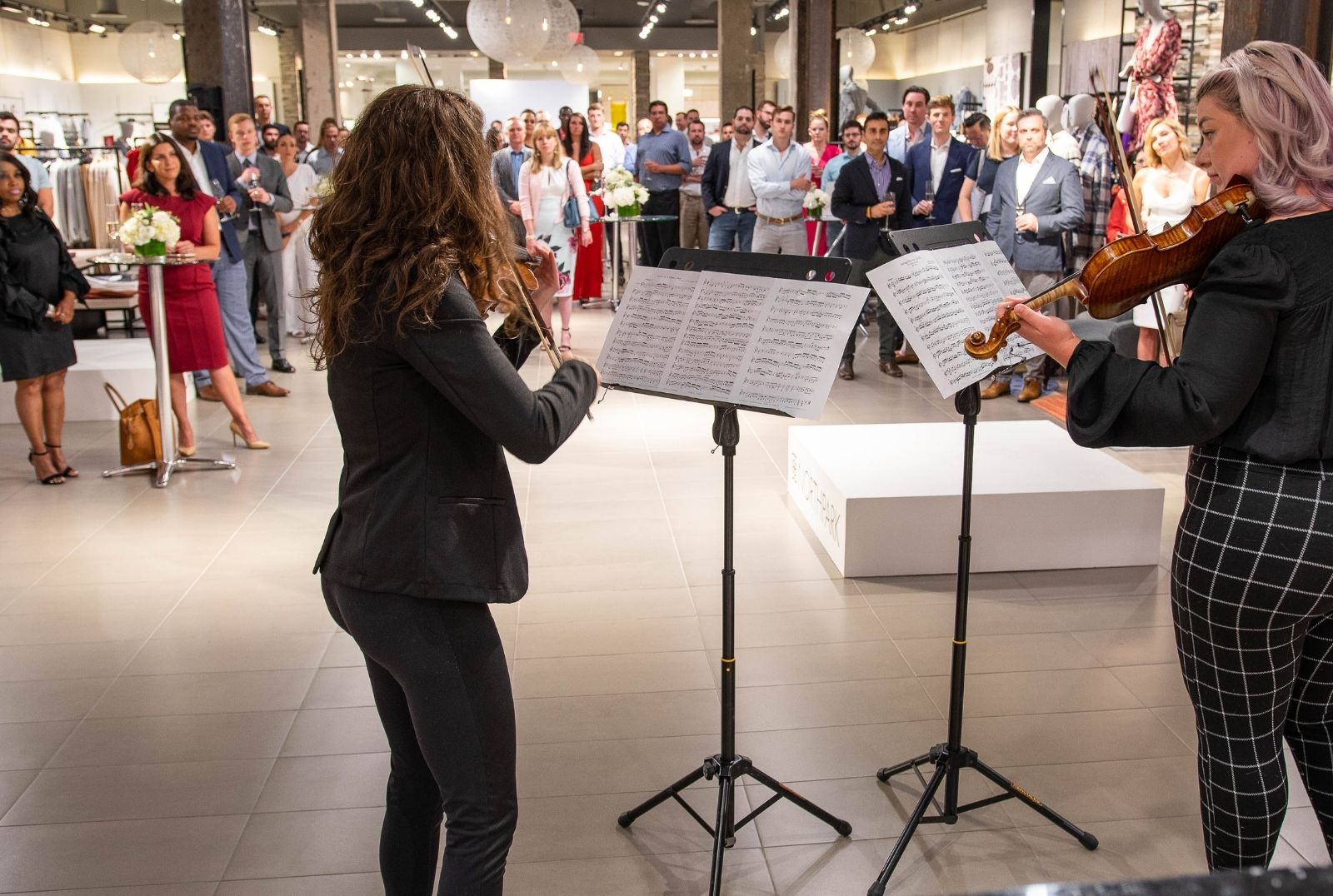 DSO Gala After Party Kick-Off Event at Neiman-Marcus with two DSO musicians performing