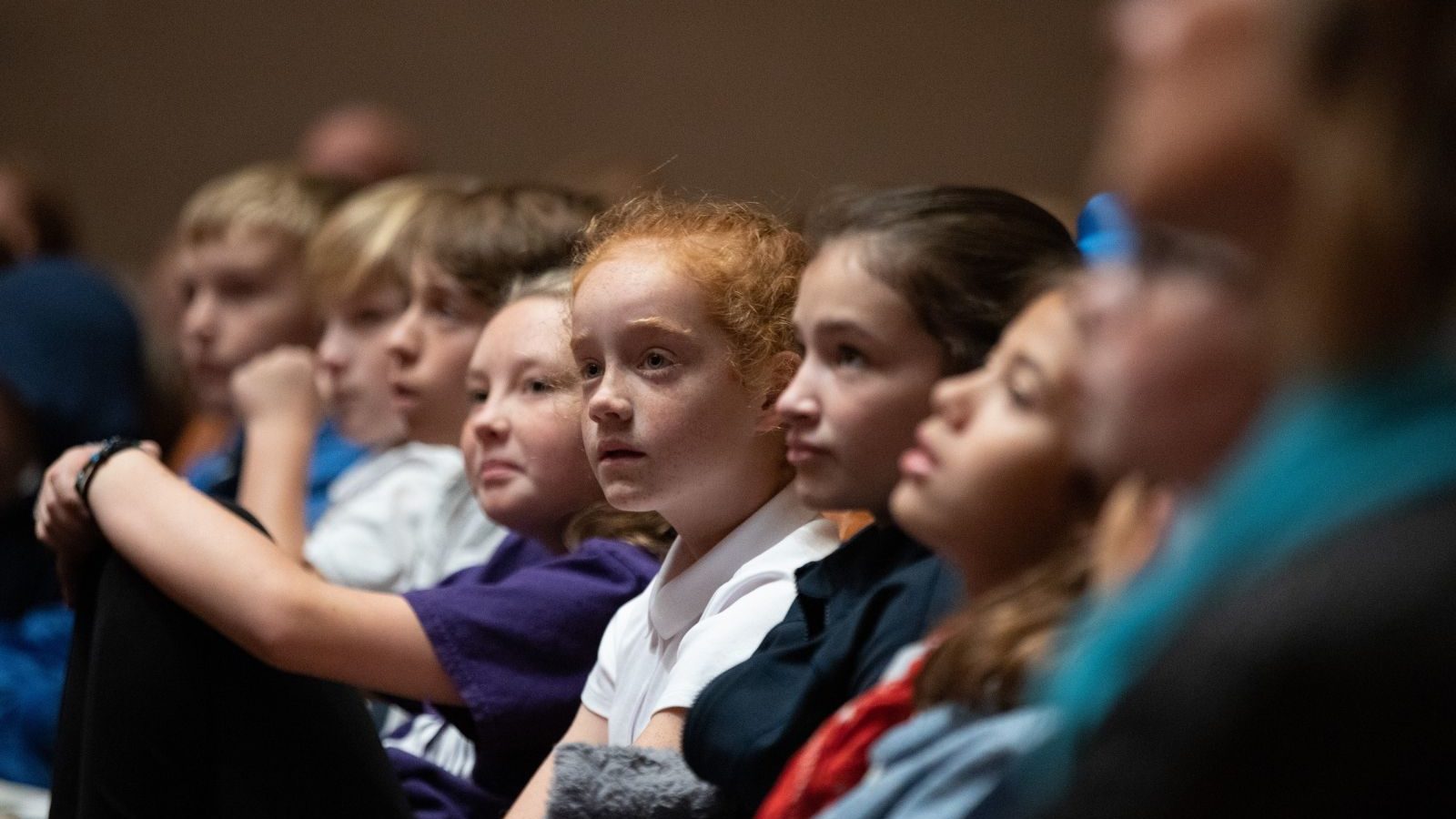 Students in the audience listening to a DSO concert