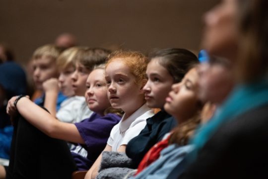 Students in the audience listening to a DSO concert