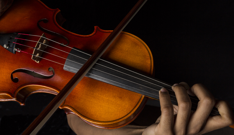 man playing violin