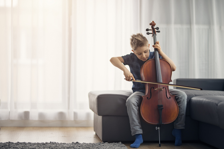 boy playing cello
